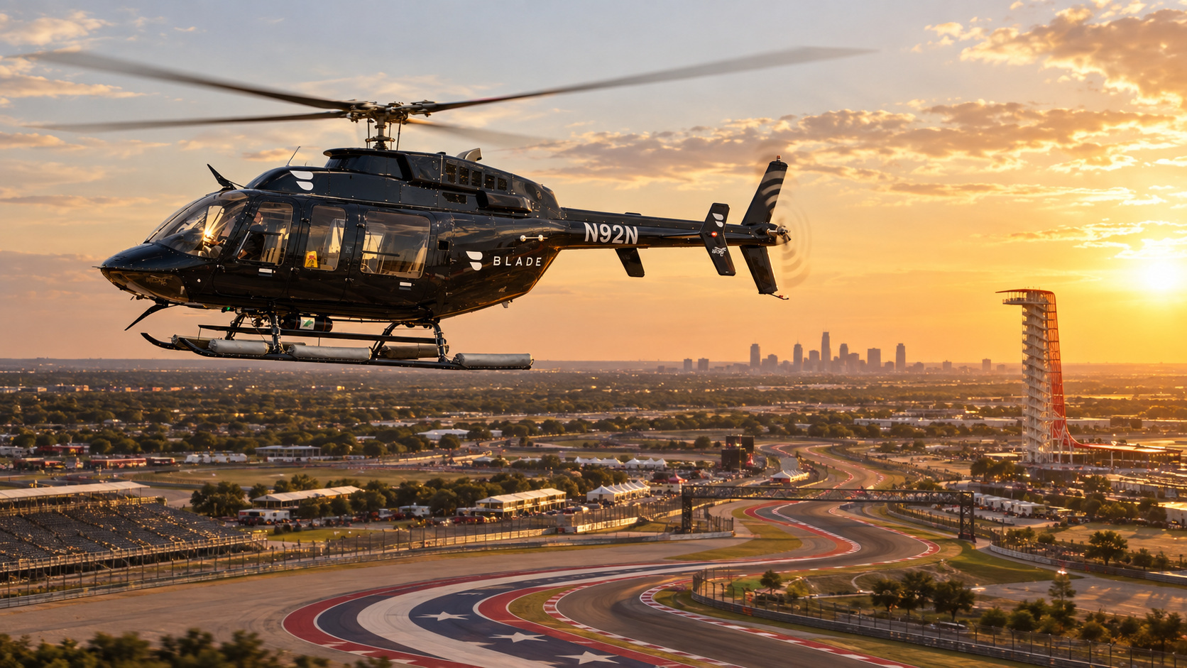 BLADE helicopter in flight over Circuit of The Americas at sunset, with the Austin skyline behind