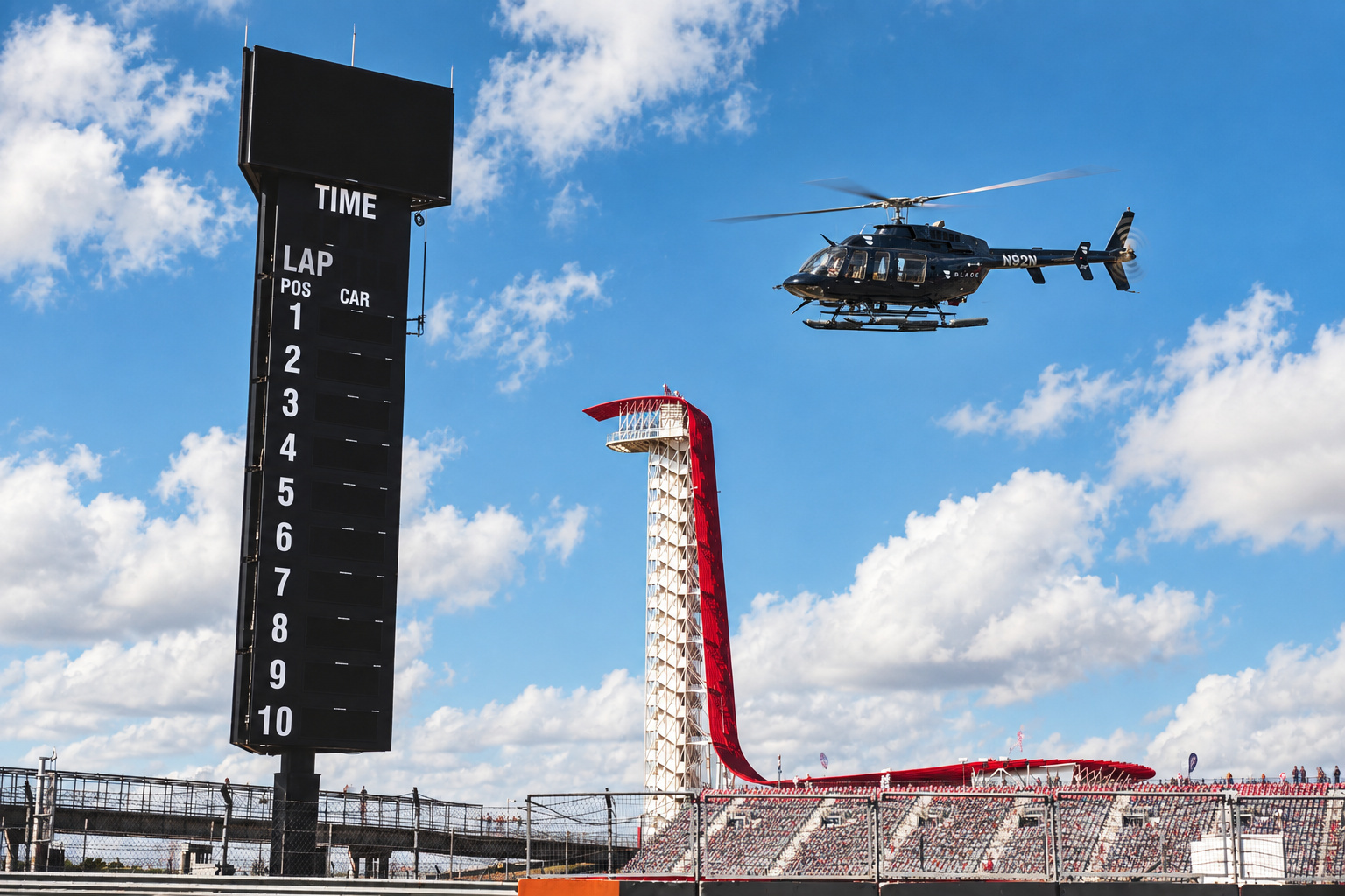BLADE helicopter flying past the Circuit of The Americas observation tower and timing tower
